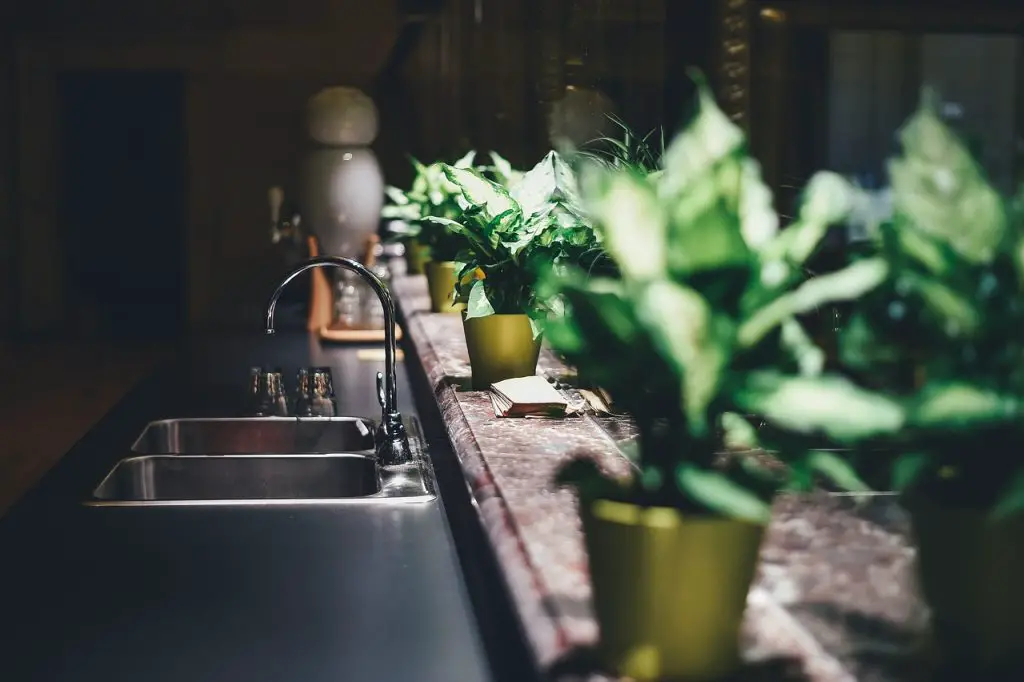 Moet ik mijn Quooker aanpassen na installatie waterontharder?