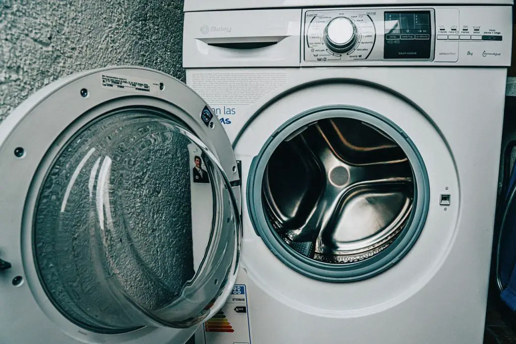 Hoe zet je het piepen van de Miele W1 wasmachine uit?